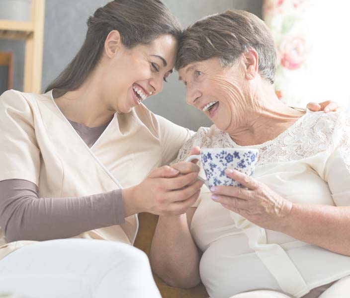 Caregiver Senior Laughing